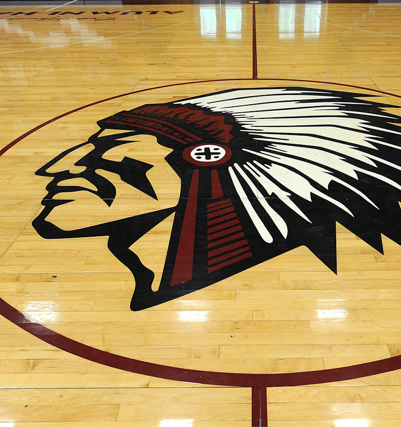 Manitou logo on basketball court